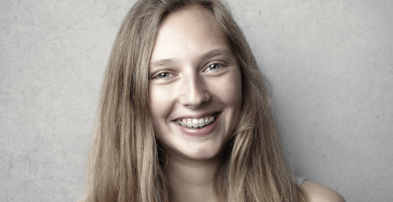 Girl with braces smiling